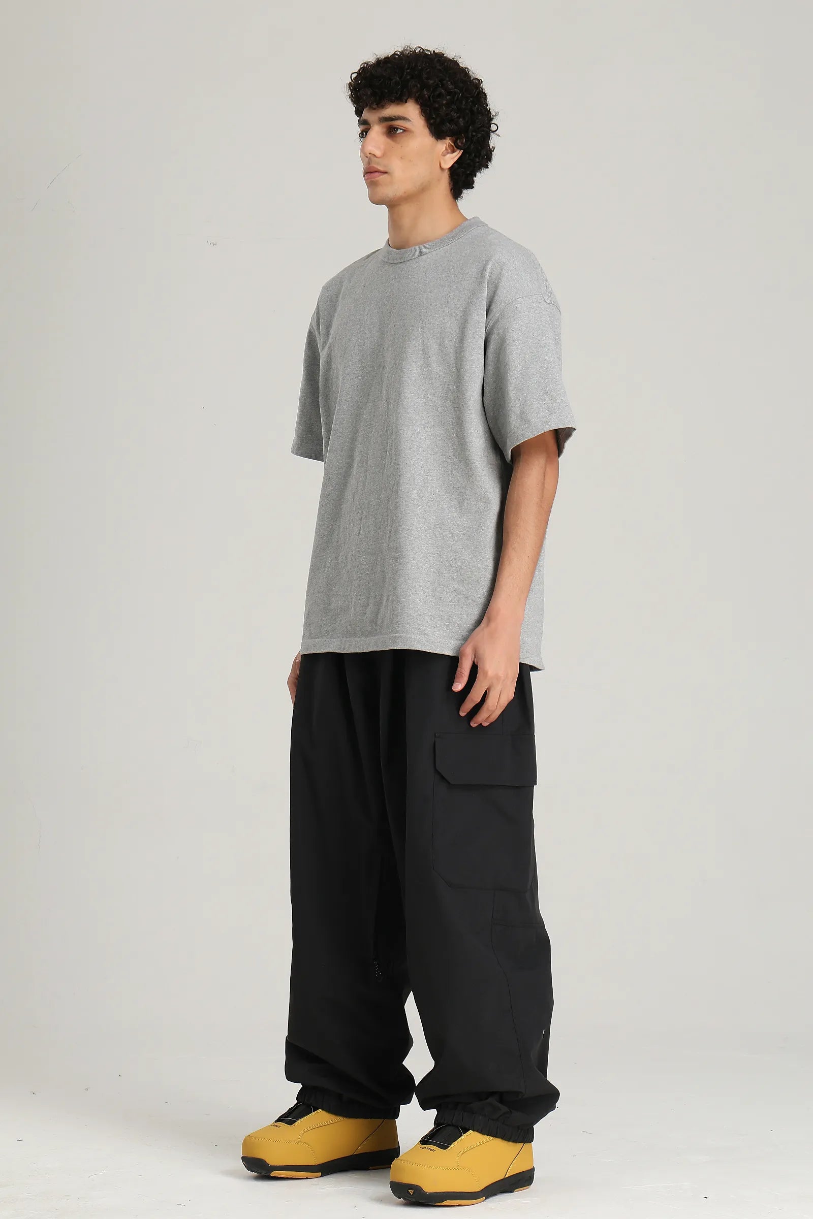 Men's Black Technical Utility Hidden Pockets Baggy Snow Pants